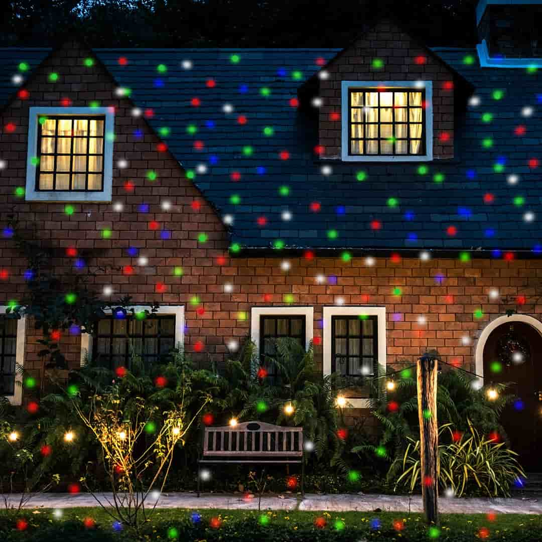 Stars projected on a house exterior by the star show projector 