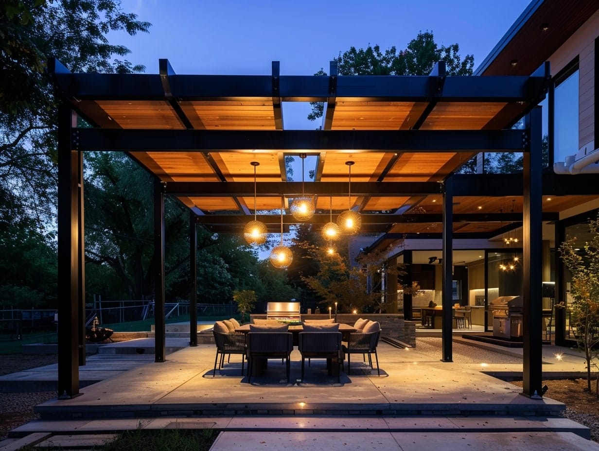 Multiple pendant lights hanging from the center of a pergola above the seating area